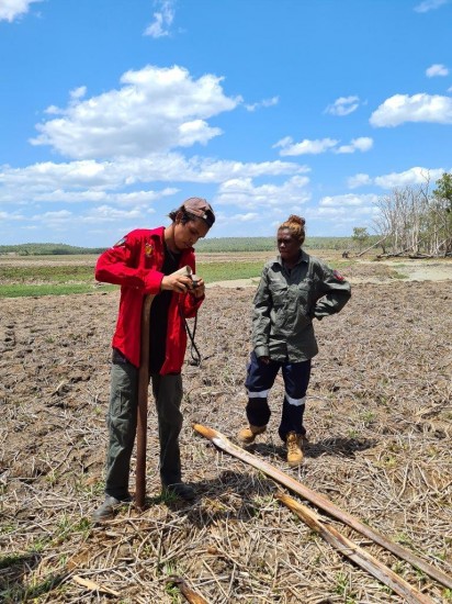 Henry Hayes and Ranger Jody-Lee Malibirr doing photo point monitoring in buffalo affected area near Mulgurram.